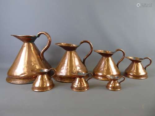 A Set of Seven Victorian Graduating Copper Haystack Measure Jugs, lead stamped Imperial Gallon, 1/2 Gallon, Quart, Pint, 1/2 Pint Gill and 1/2 Gill.