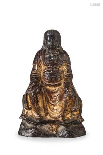 FIGURA DI DIGNITARIO IN BRONZO PARZIALMENTE DORATO, CINA, XVII SECOLO