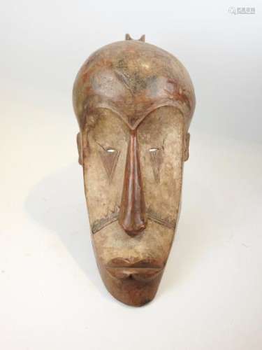 Masque N'gil Bois sculpté Gabon L 50 cm		Masque N...