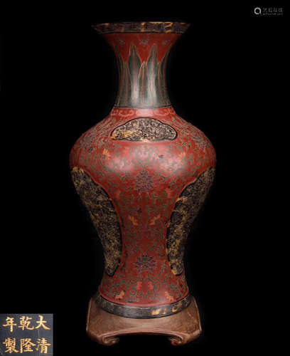 A LACQUER DECORATED GUANYIN SHAPED VASE