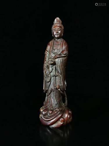 A BAMBOO CARVED GUANYIN STATUE