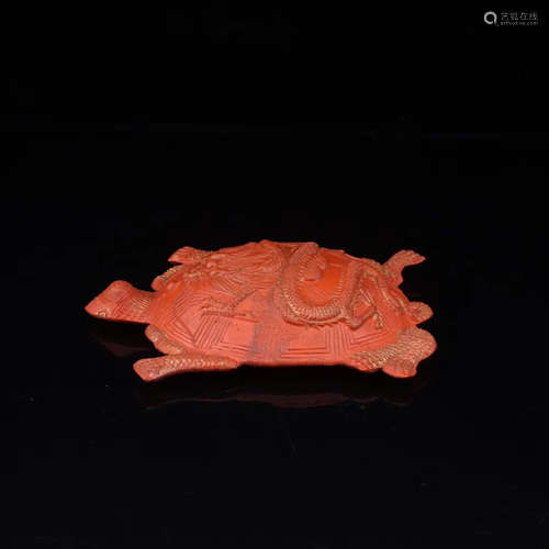 A ZHUSHA CARVED TURTLE SHAPED PENDANT