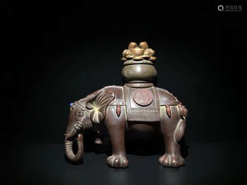 A ZISHA ELEPHANT SHAPED FIGURE