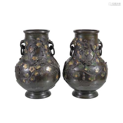 A pair of Chinese bronze and champleve vases