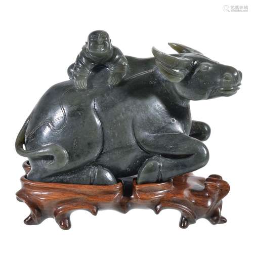 A Chinese green jadeite ‘Buffalo and Child’ carving