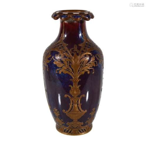 A Berlin (KPM) porcelain sang de boeuf (oxblood) glaze and gilt-wire mounted vase by Hermann August Seger (1839-1893)