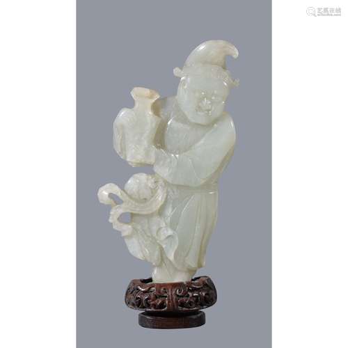 A Chinese celadon jade figure of a ‘Foreigner’