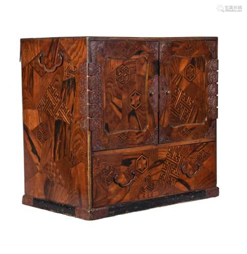 A Japanese parquetry Kodansu chest, Meiji-Tiasho, with two doors opening to six …