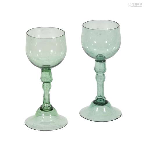 A pair of English pale-green wine glasses