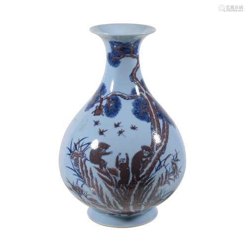 A Chinese blue lavender-ground vase, decorated in blue and white and copper-red …