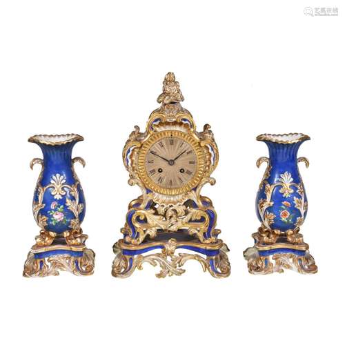 A Charles X/Louis-Philippe Paris porcelain (Ed. Honoré) blue-ground and gilt clock garniture