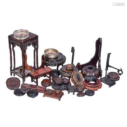 A collection of Chinese and Japanese wood stands