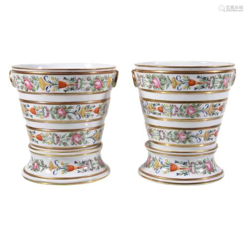 A pair of Paris porcelain jardinières and bases