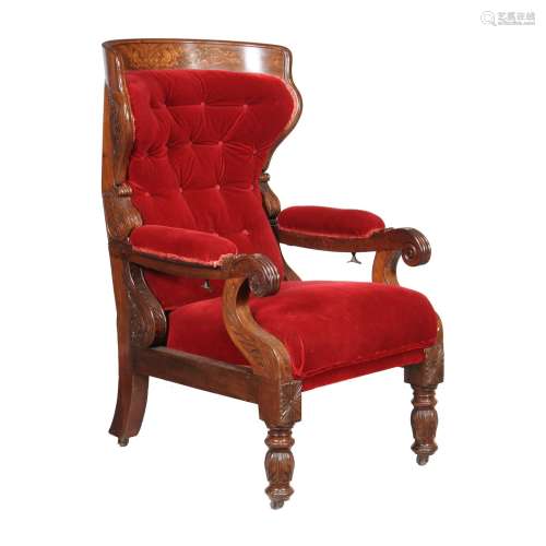 A William IV carved hardwood library armchair