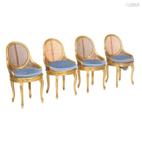 A set of four giltwood salon chairs