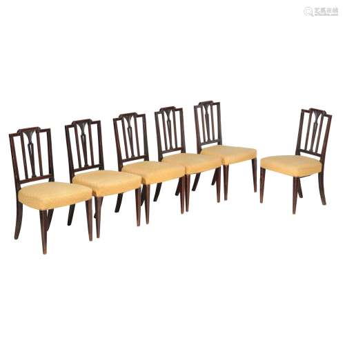 A set of thirteen mahogany dining chairs