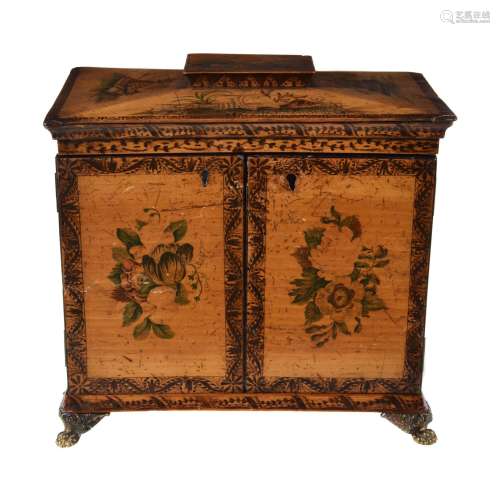 A George III penworked and painted satinwood table cabinet