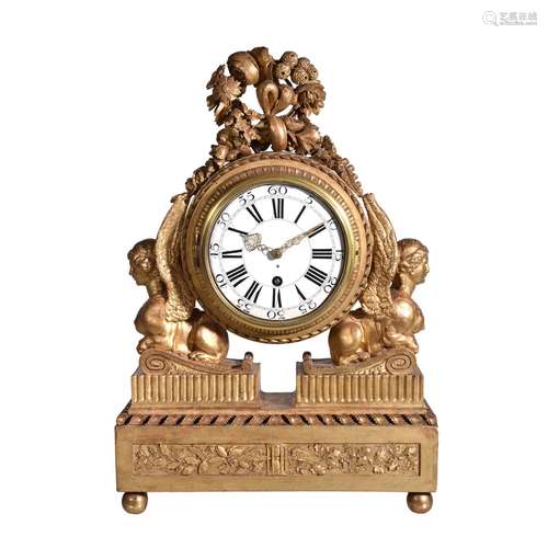 A Continental carved giltwood mantel clock