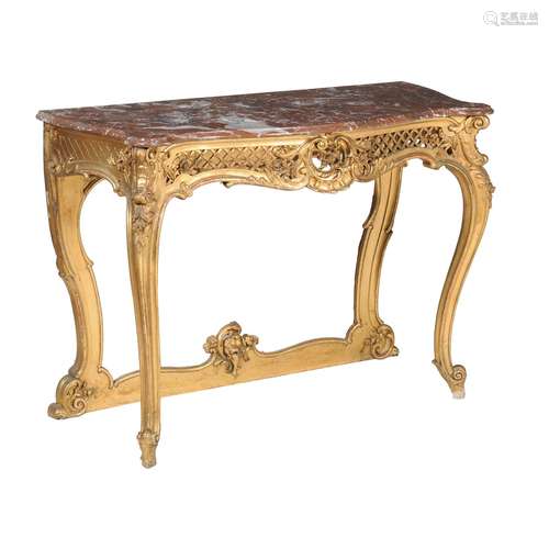 A carved giltwood and marble mounted console table