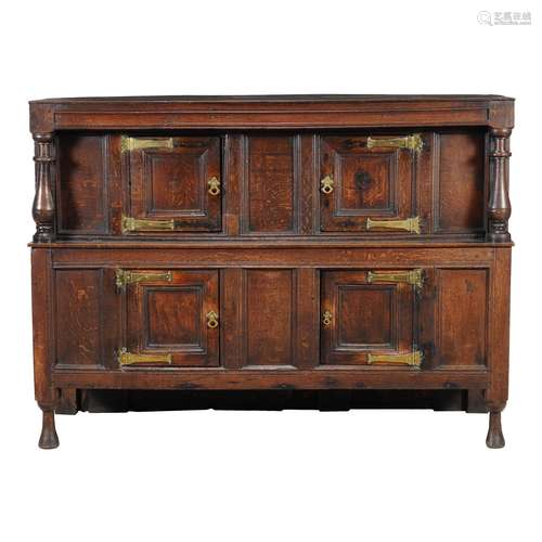 An oak court cupboard in 17th century style