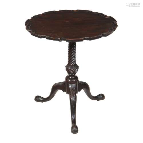 A George III carved mahogany tripod table
