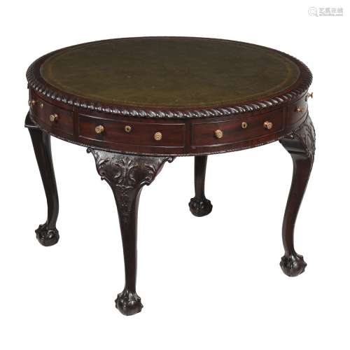 A mahogany drum library table