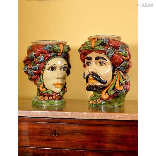A pair of modern Sicilian Maiolica style figural head jars or planters