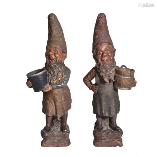 A pair of Austrian polychrome terracotta models of gnomes
