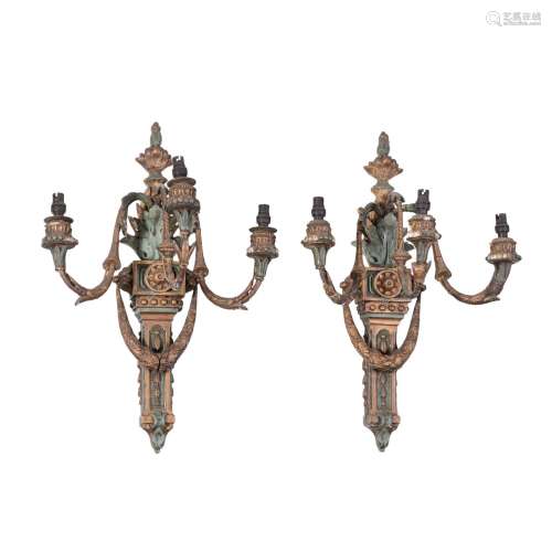 A pair of Italian painted and gilt composition three light wall appliques