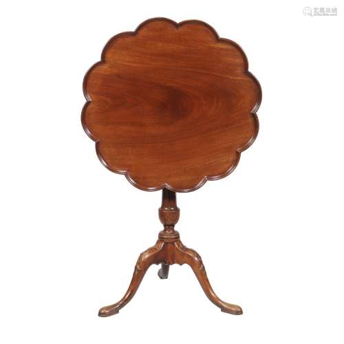 A mahogany tripod table in George III style