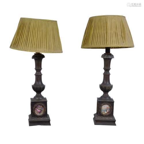 A pair of metal table lamps