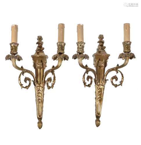 A pair of gilt bronze twin light wall appliques in Louis XV style