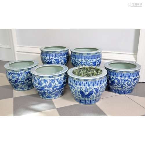 Three pairs of similar modern Chinese celadon ground and blue decorated goldfish bowls or jardinières