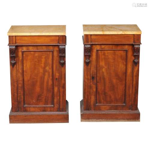 A pair of mahogany and yellow pink veined marble topped pedestal cabinets