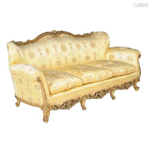 A carved giltwood and composition framed sofa in Louis XVI style