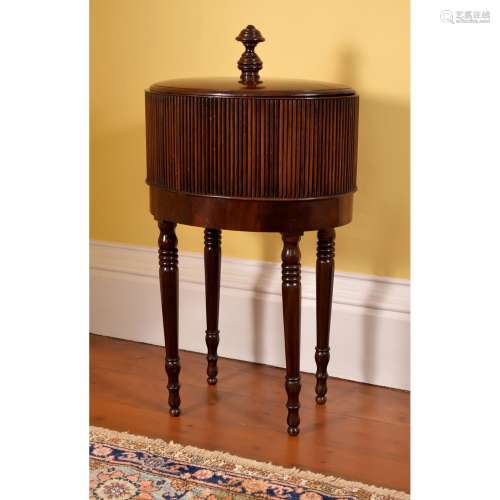 A Continental mahogany oval wine cooler on stand
