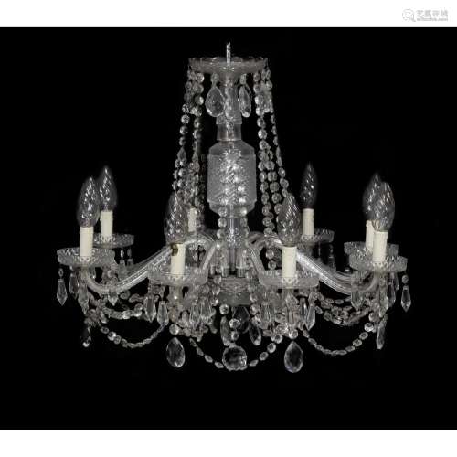 A Continental moulded and cut glass eight light chandelier