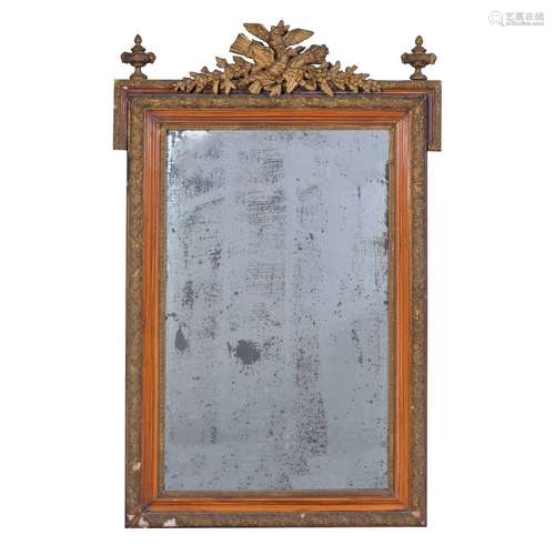 A simulated pitch pine, gilt metal mounted and gilt composition wall mirror in George III style