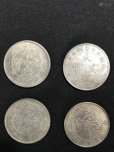 Four Chinese Coins