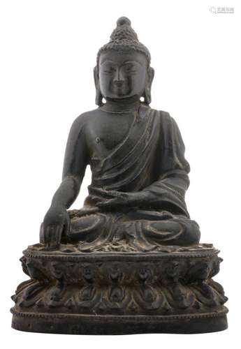 A Chinese bronze seated Buddha with some traces of gilt decoration, probably 19thC, H 19 cm