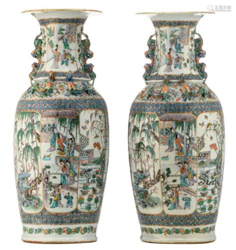 Two Chinese famille verte and polychrome relief decorated vases, the panels with animated scenes, birds and flower branches, 19thC, H 61 cm