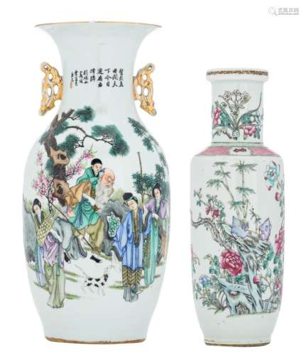 A Chinese famille rose vase, decorated with an animated scene, antiquities and calligraphic texts; added a ditto rouleau shaped vase, overall decorated with birds on a rock, flower branches and bamboo, H 35 - 43,5 cm