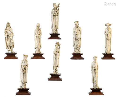 A series of ivory figures depicting the Eight Immortals, early 20thC, each item mounted on a rosewood base, partially tinted, H 14 - 15 cm - Total weight about 1144g (with base)