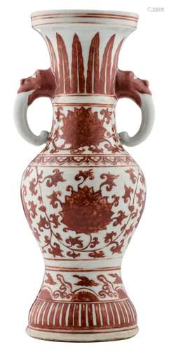 A Chinese underglaze red baluster shaped vase, decorated with scrolling lotus, the handles dragon head shaped, H 32 cm