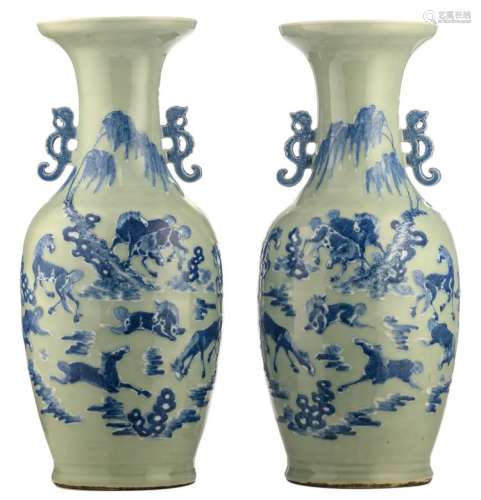 A pair of Chinese celadon ground blue and white vases, decorated with horses in a landscape, H 60 cm