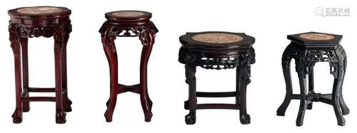 Four Oriental carved hardwood stools with a marble top, H 48 - 62 - ø 36 - 39 cm