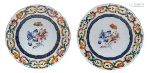 An 18thC Chinese famille rose export dish, the medallion decorated in the manner of Maria Sibylla Merian with orchids, a butterfly, a snail and a caterpillar; added a bigger similar dish, ø 23,5 - 25 cm