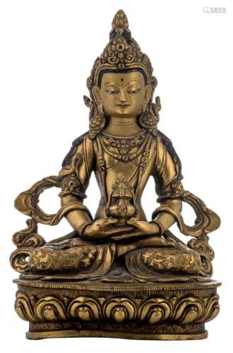 A Chinese gilt bronze seated Buddha with traces of polychromy, H 21,5 cm