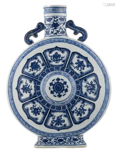 A large blue and white moonflask decorated with scrolling lotus and Buddhist symbols, with a Qianlong mark, H 49 cm