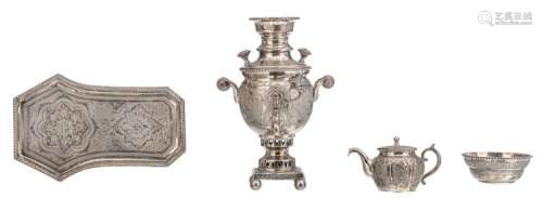 A 20thC Central Asia four-part silver samovar set consisting of the samovar, a sugar bowl, a tea pot and the salver, unknown hallmarks but tested on silver purity, H 3,5 - 20,5 cm - Weight: about 990 g